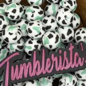 Exclusive 15mm Tucker Black cow print silicone bead round